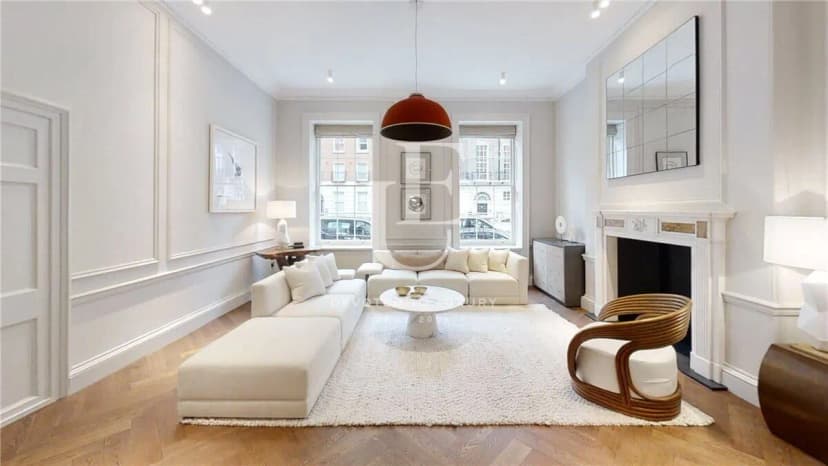 Elegant duplex apartment with high ceilings and a private garden